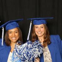 GradFest photobooth two friends with pom poms